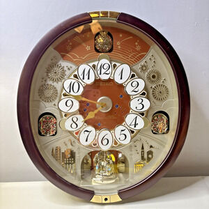 Seiko Musical Animated Wall Clock Melodies in Motion Rotating Dial Pendulum